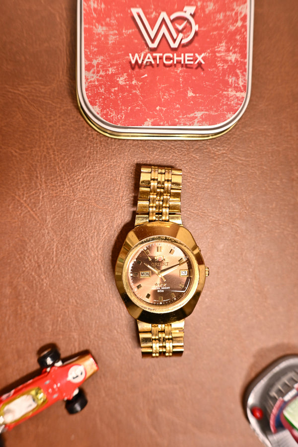 vintage Orient Tristar Automatic Brown Sunburst Dial 21 Jewels (EM70-A0) | Watchex India